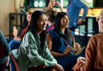Three-women-sitting-and-conversing